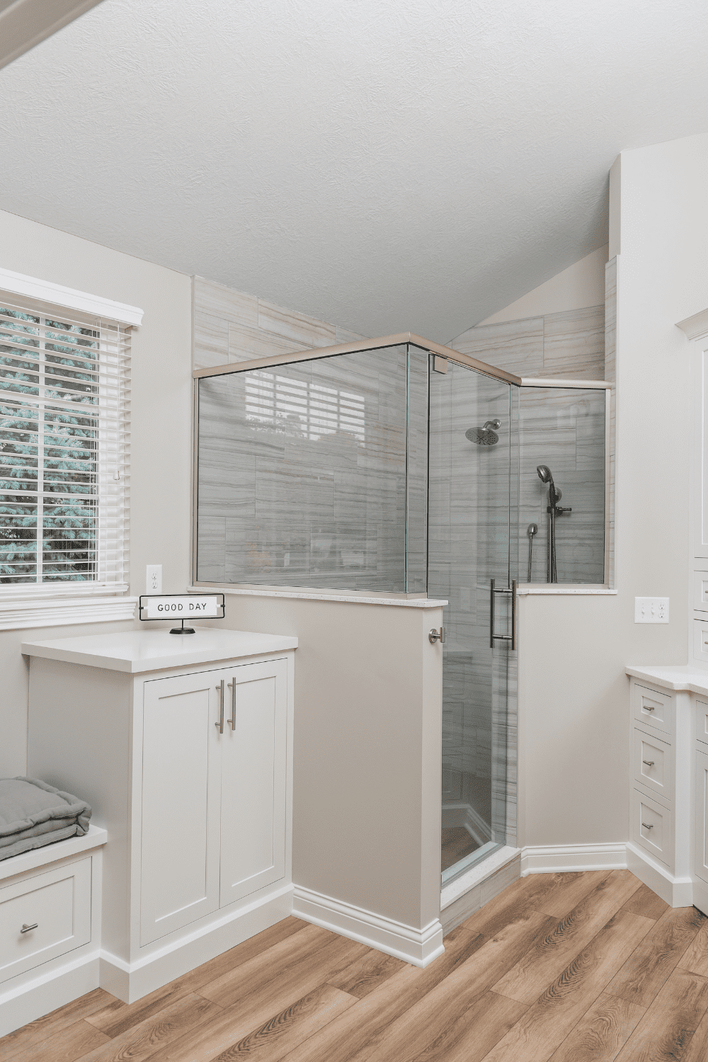 Nicholas Design Build | A glass shower stall in a bathroom remodel.