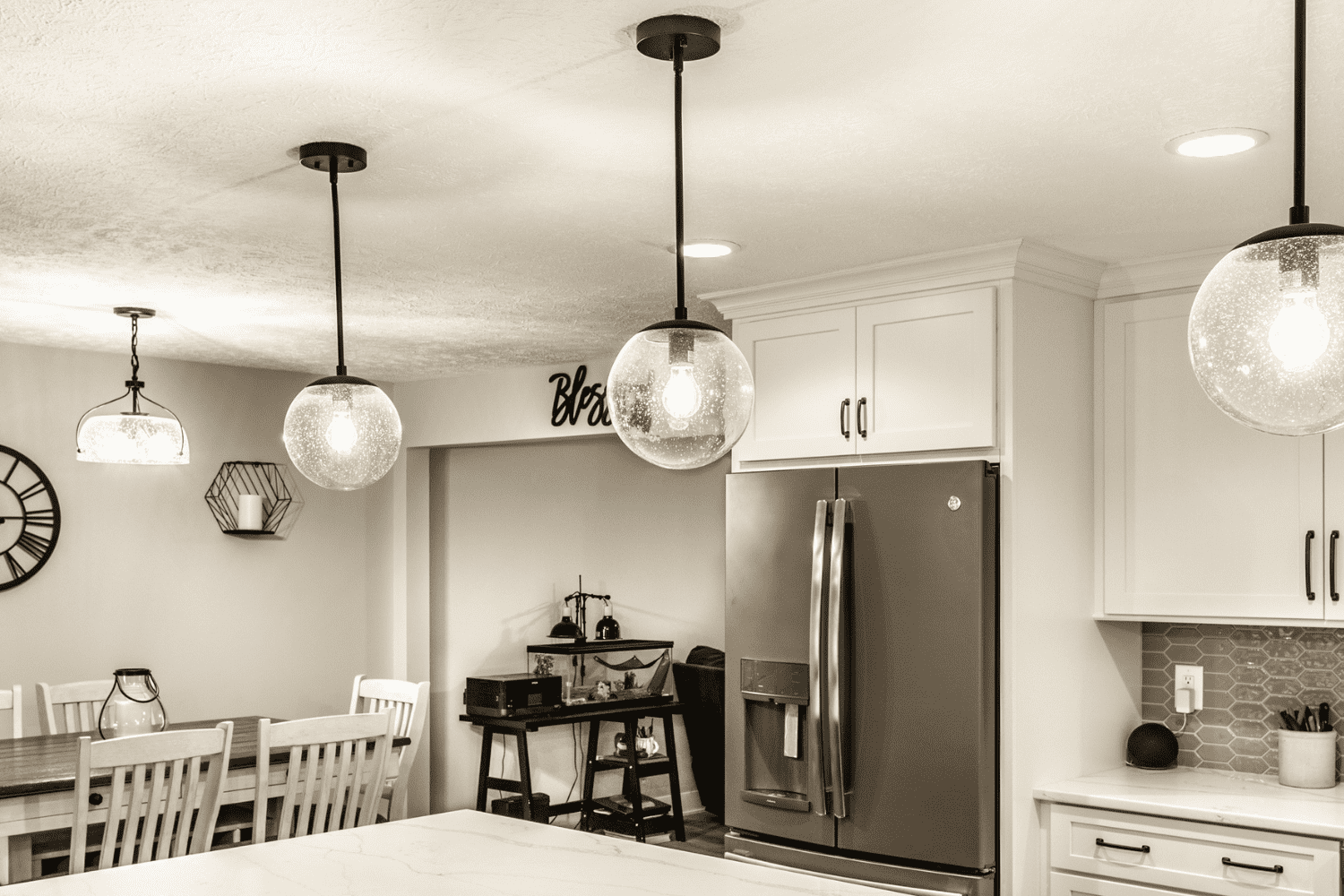 Nicholas Design Build | A black and white photo of a neutral kitchen.