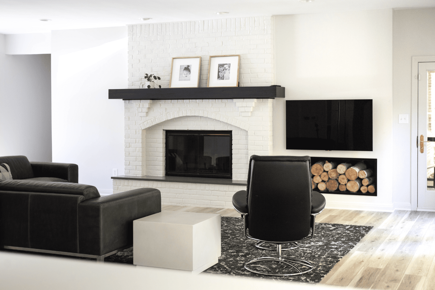 Nicholas Design Build | A living room with a fireplace.