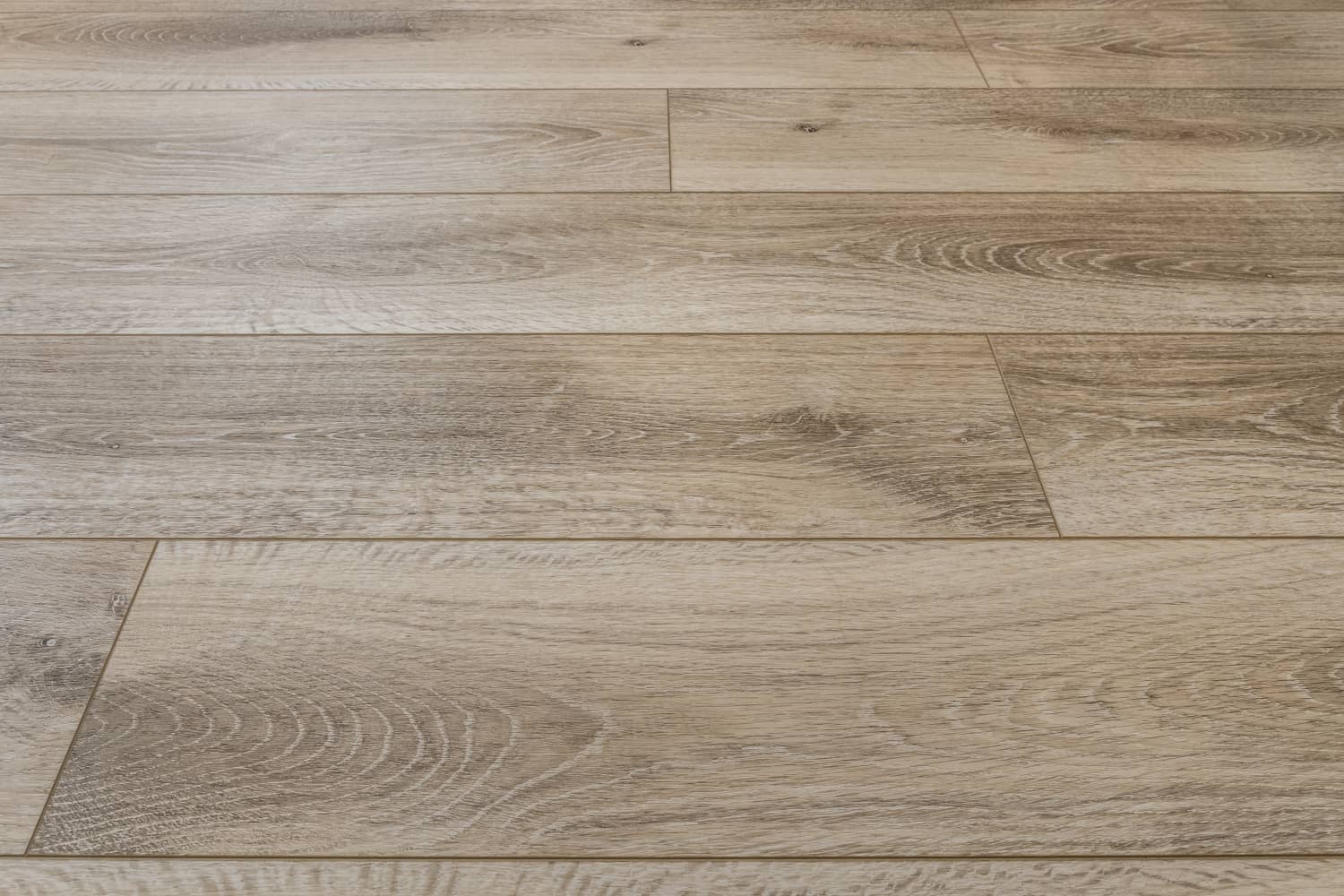 Nicholas Design Build | A close up view of a modern wooden floor.
