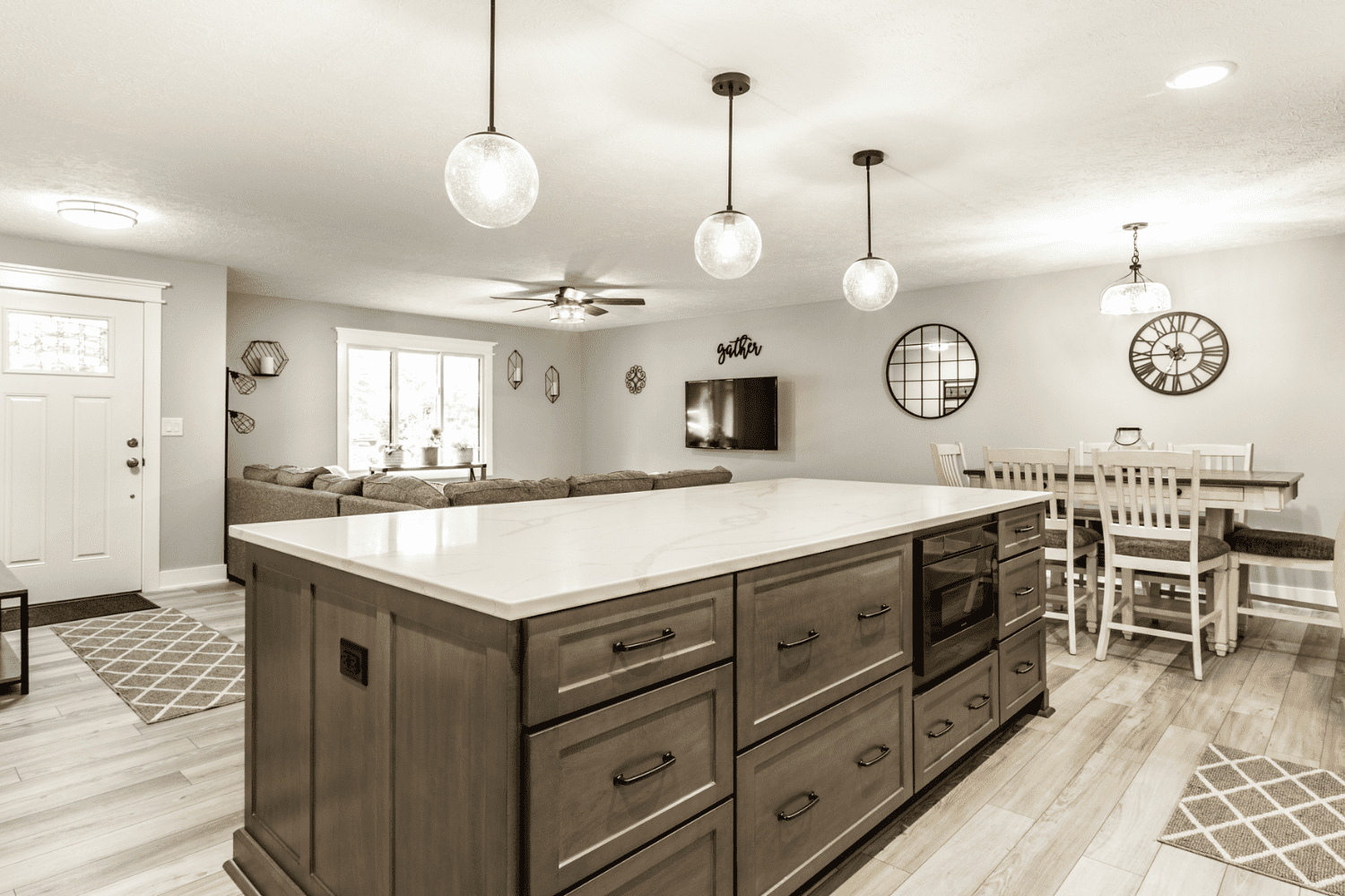 Nicholas Design Build | A neutral kitchen captured in a black and white photo.