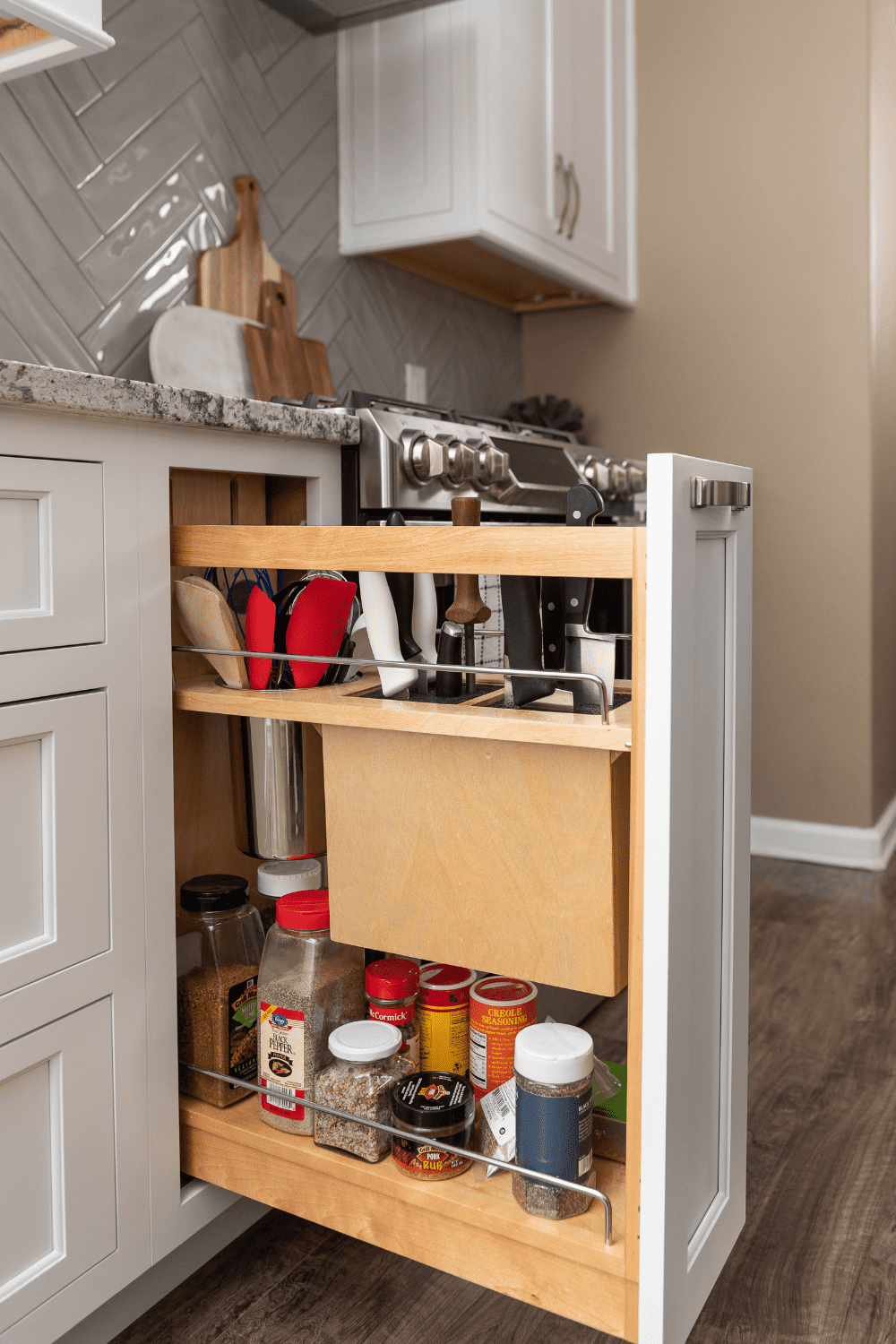 Nicholas Design Build | A versatile kitchen with a pull out spice rack.