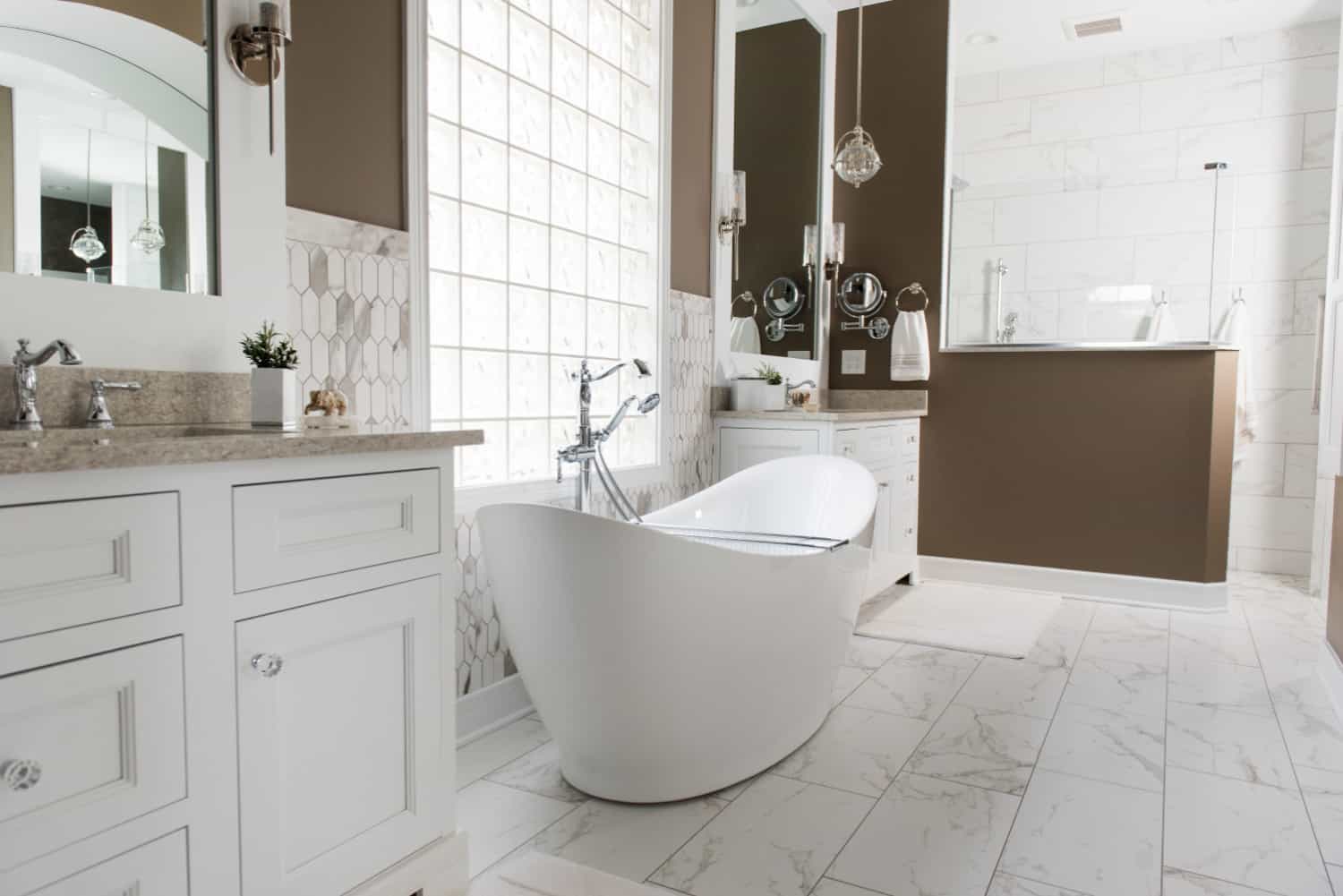 Nicholas Design Build | An oasis-like bathroom with a large tub.