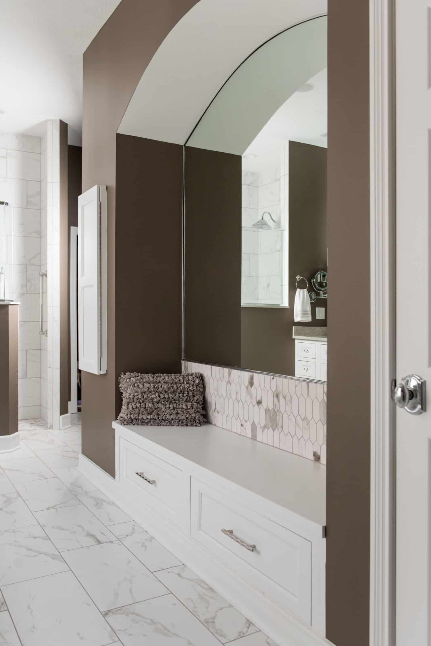 Nicholas Design Build | A serene oasis of a bathroom with a bench and mirror.