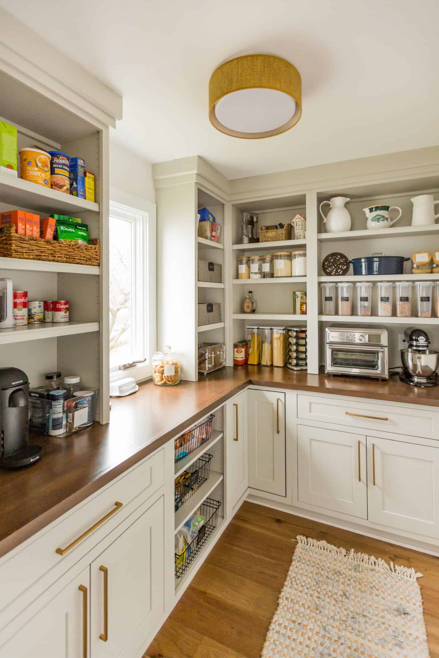 Nicholas Design Build | A remodeled kitchen with lots of shelves and counter space.