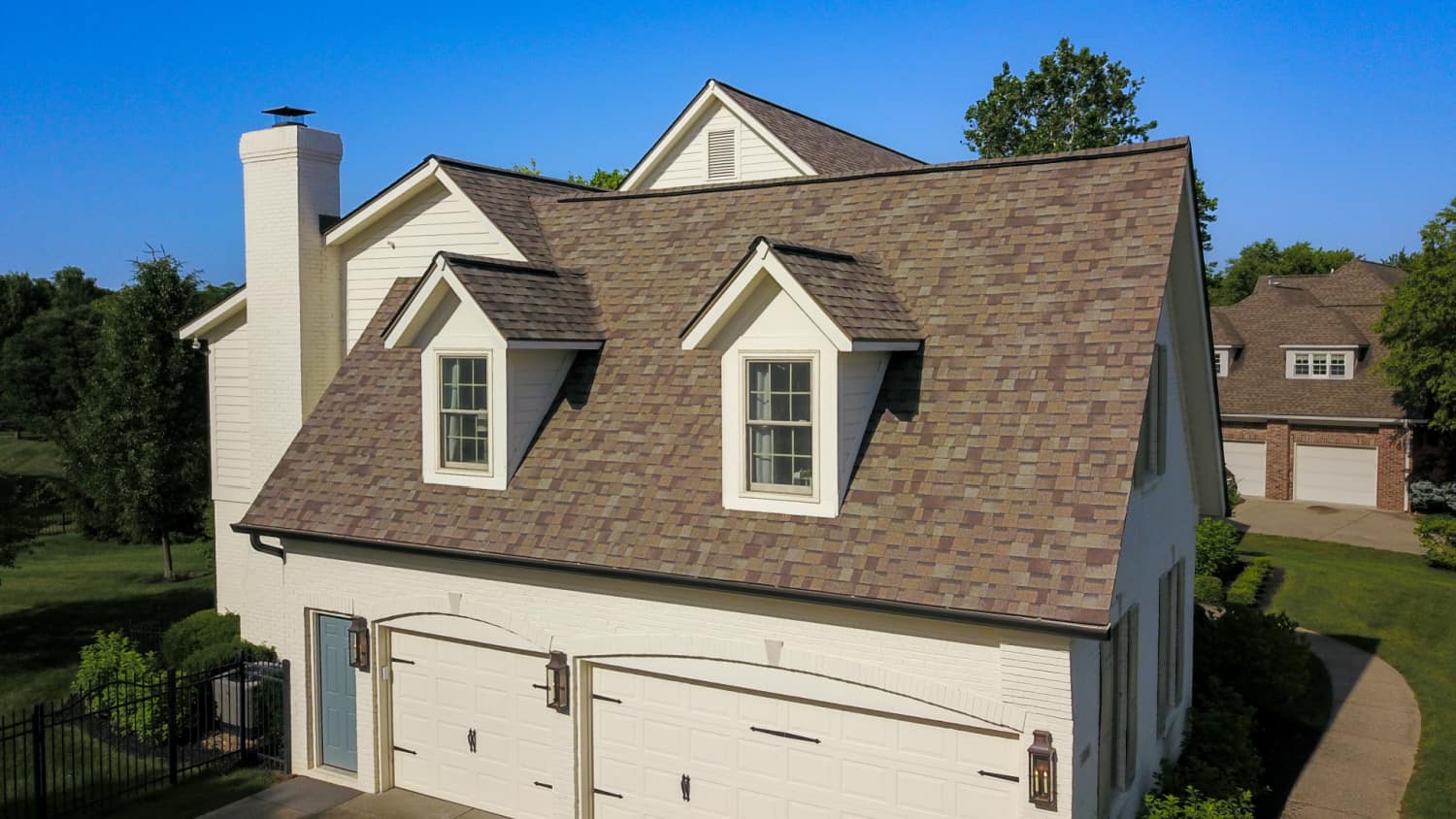 Nicholas Design Build | A remodel of a home with two garages that provides an aerial view.