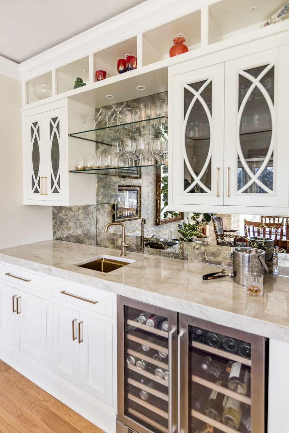 Nicholas Design Build | Remodel a kitchen with white cabinets and a wine cooler.