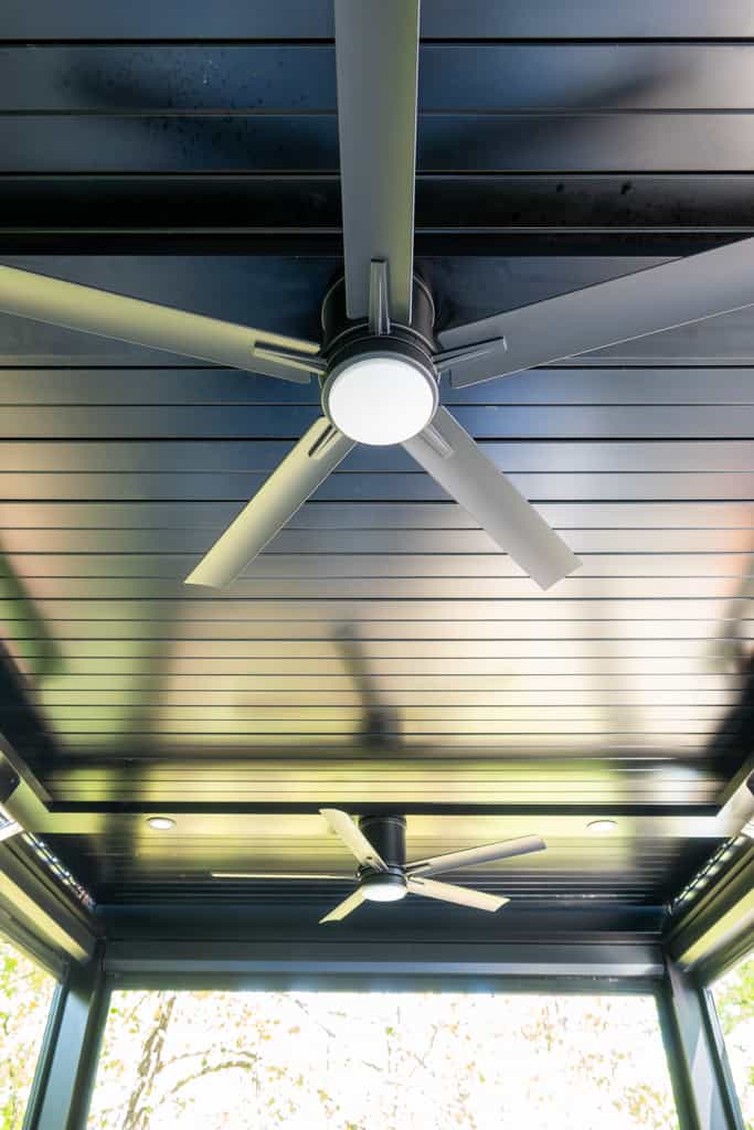 Nicholas Design Build | A ceiling fan in a room.