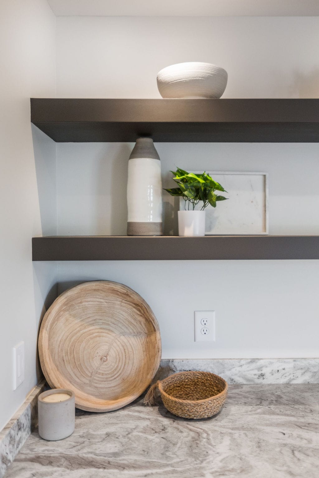 Nicholas Design Build | A kitchen with shelves and a bowl on the counter.