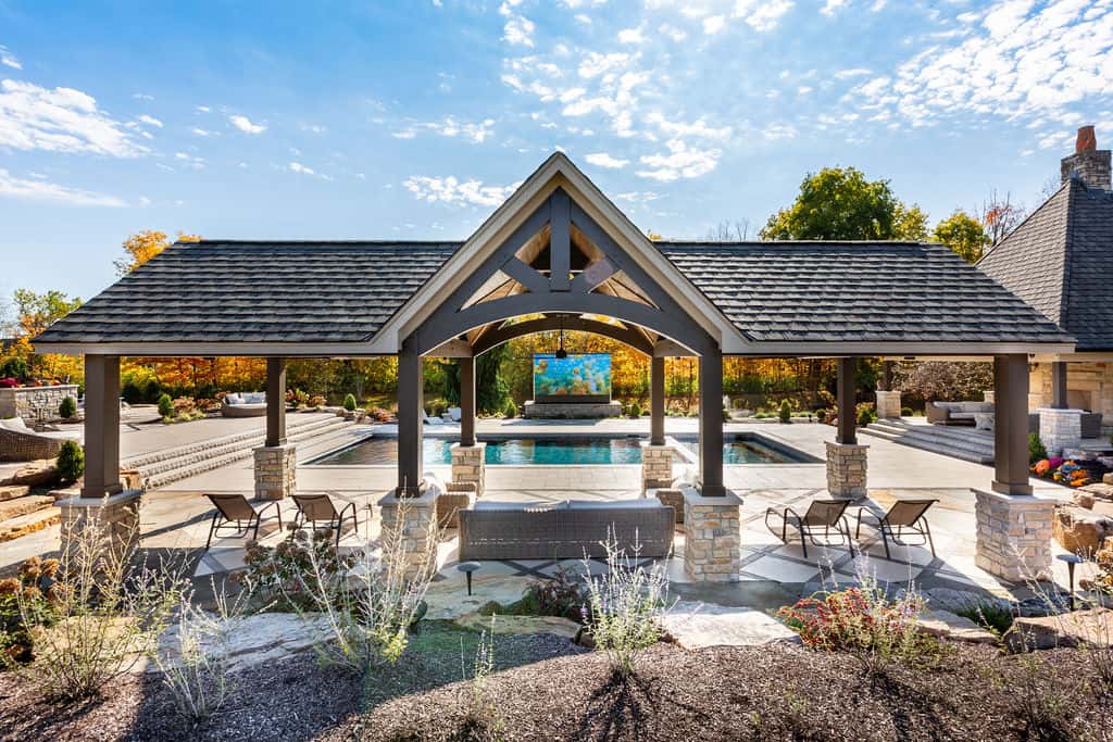 Nicholas Design Build | A backyard with a pool and gazebo.